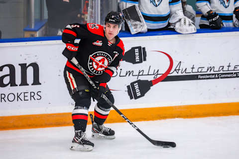 WINNIPEG, CANADA – JANUARY 21: Denton Mateychuk #5 of the Moose Jaw Warriors plays the puck during third period action against the Winnipeg ICE at Wayne Fleming Arena on January 21, 2023 in Winnipeg, Manitoba, Canada. (Photo by Jonathan Kozub/Getty Images)