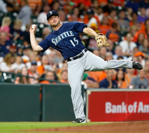 HOUSTON, TX – SEPTEMBER 19: Kyle Seager #15 of the Seattle Mariners throws to first base but unable to retire George Springer #4 of the Houston Astros in the fourth inning at Minute Maid Park on September 19, 2018 in Houston, Texas. (Photo by Bob Levey/Getty Images)