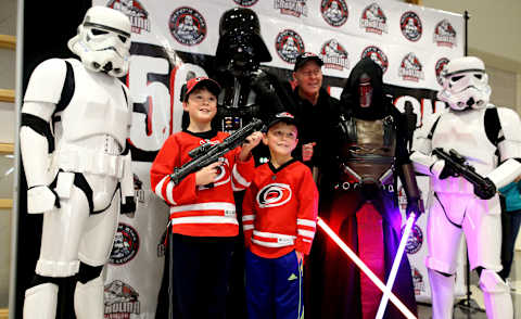 RALEIGH, NC – DECEMBER 3: Fans of the Carolina Hurricanes pose with Star Wars characters prior to an NHL game against the Florida Panthers on December 3, 2017 at PNC Arena in Raleigh, North Carolina. (Photo by Gregg Forwerck/NHLI via Getty Images)