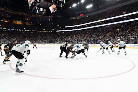 LAS VEGAS, NEVADA – SEPTEMBER 29: Cody Glass #9 of the Vegas Golden Knights faces off with Logan Couture #39 of the San Jose Sharks during the first period at T-Mobile Arena on September 29, 2019 in Las Vegas, Nevada. (Photo by David Becker/NHLI via Getty Images)