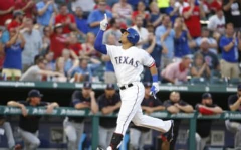 Aug 25, 2016; Arlington, TX, USA; Texas Rangers left fielder Carlos Gomez (14) rounds the bases after hitting a three run home run against the Cleveland Indians at Globe Life Park in Arlington. Mandatory Credit: Tim Heitman-USA TODAY Sports