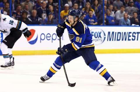 May 23, 2016; St. Louis, MO, USA; St. Louis Blues right wing Vladimir Tarasenko (91) controls the puck against the San Jose Sharks in the third period in game five of the Western Conference Final of the 2016 Stanley Cup Playoffs at Scottrade Center. The Sharks won 6-3. Mandatory Credit: Aaron Doster-USA TODAY Sports