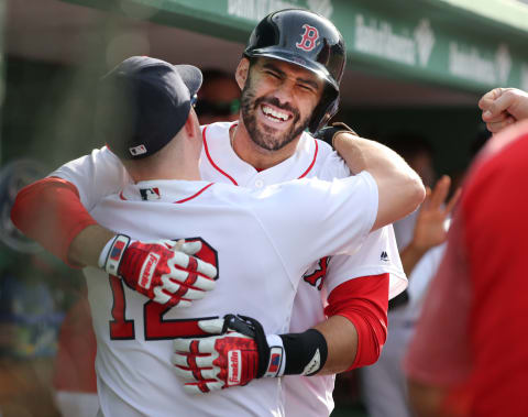 BOSTON – JUNE 9: Boston Red Sox player J.D Martinez celebrates in the dugout with teammate Brock Holt after hitting a two-run home run during the fifth inning. The Boston Red Sox host the Chicago White Sox in a regular season MLB baseball game at Fenway Park in Boston on June 9, 2018. (Photo by Matthew J. Lee/The Boston Globe via Getty Images)