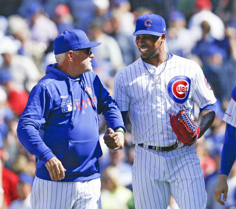 CHICAGO, ILLINOIS – JUNE 07: Chicago Cubs manager Joe Maddon, with Pedro Strop #46 after the final out of their team’s 3-1 win over the St. Louis Cardinals at Wrigley Field on June 07, 2019 in Chicago, Illinois. (Photo by Nuccio DiNuzzo/Getty Images)