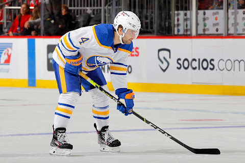 NEWARK, NEW JERSEY – OCTOBER 23: Will Butcher #4 of the Buffalo Sabres in action against the New Jersey Devils at Prudential Center on October 23, 2021 in Newark, New Jersey. The Devils defeated the Sabres 2-1 in overtime. (Photo by Jim McIsaac/Getty Images)