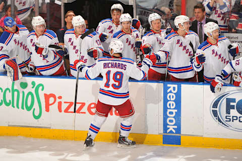 SUNRISE, FL – DECEMBER 31: Brad Richards #19 of the New York Rangers celebrates his game winning goal in the overtime shootout period with teammates against the Florida Panthers at the BB&T Center on December 31, 2013 in Sunrise, Florida. (Photo by Jeffrey R. Sanzare/NHLI via Getty Images)