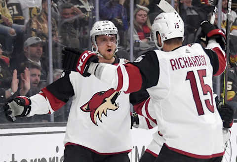 LAS VEGAS, NEVADA – DECEMBER 28: Michael Grabner #40 and Brad Richardson #15 of the Arizona Coyotes celebrate after Grabner scored a first-period goal against the Vegas Golden Knights during their game at T-Mobile Arena on December 28, 2019 in Las Vegas, Nevada. (Photo by Ethan Miller/Getty Images)