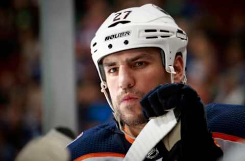 VANCOUVER, BC – DECEMBER 17: Milan Lucic #27 of the Edmonton Oilers looks on from the bench during their NHL game against the Vancouver Canucks at Rogers Arena December 17, 2018 in Vancouver, British Columbia, Canada. (Photo by Jeff Vinnick/NHLI via Getty Images)”n