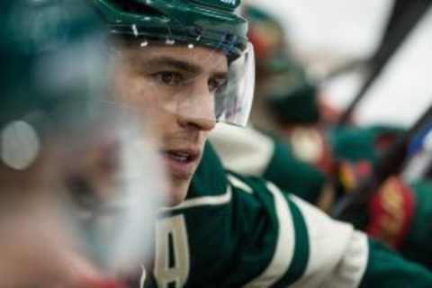 Feb 22, 2015; Saint Paul, MN, USA; Minnesota Wild forward Zach Parise (11) looks on during the third period against the Dallas Stars at Xcel Energy Center. The Wild defeated the Stars 6-2. Brace Hemmelgarn-USA TODAY Sports