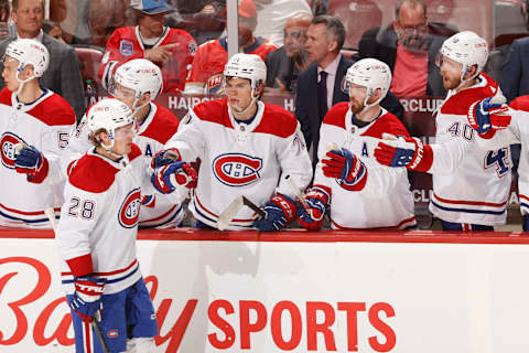 SUNRISE, FL – MARCH 29: Teammates congratulate Christian Dvorak #28 of the Montreal Canadiens after he scored a goal in the second period to tie the game against the Florida Panthers at the FLA Live Arena on March 29, 2022 in Sunrise, Florida. (Photo by Joel Auerbach/Getty Images)