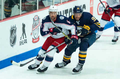 CLINTON, NY – SEPTEMBER 25: Columbus Blue Jackets Defenseman Adam Clendening (6) and Buffalo Sabers Right Wing Justin Bailey (95) skate for position during the first period of the Columbus Blue Jackets versus the Buffalo Sabers preseason game on September 25, 2018, at Clinton Arena in Clinton, New York. (Photo by Gregory Fisher/Icon Sportswire via Getty Images)