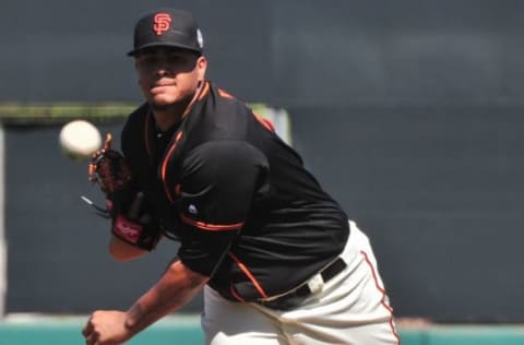 Mar 9, 2016; Scottsdale, AZ, USA; San Francisco Giants starting pitcher Adalberto Mejia (76) throws during the second inning against the Colorado Rockies at Scottsdale Stadium. Mandatory Credit: Matt Kartozian-USA TODAY Sports