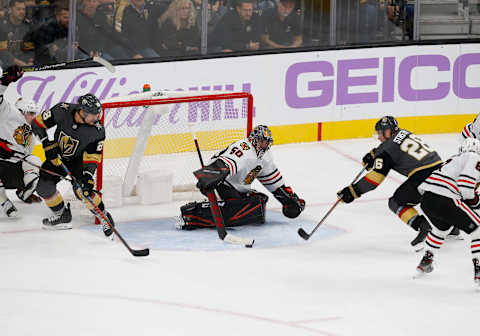 LAS VEGAS, NV – NOVEMBER 13: Chicago Blackhawks goaltender Corey Crawford (50) pokes at the puck during a regular season game against the Vegas Golden Knights Wednesday, Nov. 13, 2019, at T-Mobile Arena in Las Vegas, Nevada. (Photo by: Marc Sanchez/Icon Sportswire via Getty Images)