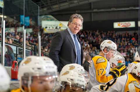 KELOWNA, CANADA – OCTOBER 25: Head coach Kelly McCrimmon of Brandon Wheat Kings stands on the bench during first period against the Kelowna Rockets on October 25, 2014 at Prospera Place in Kelowna, British Columbia, Canada. McCrimmon brings a host of connections to Team Canada and North American Junior Hockey to the franchise. (Photo by Marissa Baecker/Getty Images)