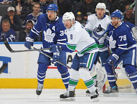 TORONTO, ON – MARCH 5: J.T. Miller #9 and Tanner Pearson #70 of the Vancouver Canucks skate against Auston Matthews #34 and T.J. Brodie #78 of the Toronto Maple Leafs during an NHL game at Scotiabank Arena on March 5, 2022 in Toronto, Ontario, Canada. The Canucks defeated the Maple Leafs 6-4. (Photo by Claus Andersen/Getty Images)