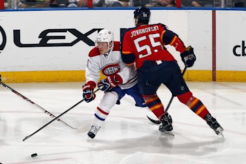 SUNRISE, FL – MARCH 29: Brendan Gallagher #11 of the Montreal Canadiens collides with Ed Jovanovski #55 of the Florida Panthers at the BB&T Center on March 29, 2014 in Sunrise, Florida. (Photo by Eliot J. Schechter/NHLI via Getty Images)