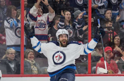 Feb 19, 2017; Ottawa, Ontario, CAN; Winnipeg Jets center Mathieu Perreault (85) celebrates his goal scored in the first period against the Ottawa Senators at Canadian Tire Centre. Mandatory Credit: Marc DesRosiers-USA TODAY Sports