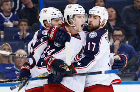 TAMPA, FL – JANUARY 13: Josh Anderson #34 of the Columbus Blue Jackets celebrates a goal with teammates Boone Jenner #38 and Brandon Dubinsky #17 against the Tampa Bay Lightning during the second period at Amalie Arena on January 13, 2017 in Tampa, Florida. (Photo by Scott Audette/NHLI via Getty Images)