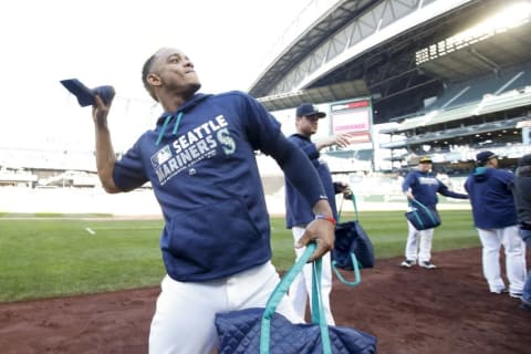 Oct 2, 2016; Seattle, WA, USA; Seattle Mariners shortstop Ketel Marte (4) throws out a t-shirt for a fan after the last game against the Oakland Athletics at Safeco Field. Oakland won 3-2. Mandatory Credit: Jennifer Buchanan-USA TODAY Sports