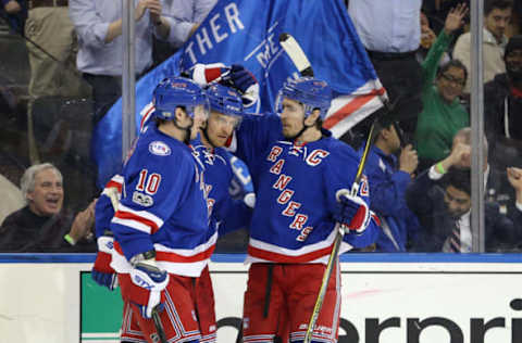 Mar 13, 2017; New York, NY, USA; New York Rangers right wing Michael Grabner (40) celebrates his goal against the Tampa Bay Lightning with center J.T. Miller (10) and defenseman Ryan McDonagh (27) during the second period at Madison Square Garden. Mandatory Credit: Brad Penner-USA TODAY Sports