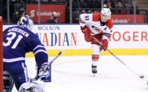 Nov 22, 2016; Toronto, Ontario, CAN; Carolina Hurricanes left wing Jeff Skinner (53) shoots as Toronto Maple Leafs goalie Frederik Andersen (31) guards the net at Air Canada Centre. The Hurricanes beat the Maple Leafs 2-1. Mandatory Credit: Tom Szczerbowski-USA TODAY Sports