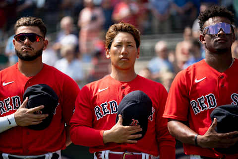 FORT MYERS, FL – FEBRUARY 24: Wilyer Abreu #86 of the Boston Red Sox, Masataka Yoshida #7 of the Boston Red Sox, and Ceddanne Rafaela #78 of the Boston Red Sox look on during the National Anthem ahead of a game against the Northeastern University Huskies on February 24, 2023 at JetBlue Park at Fenway South in Fort Myers, Florida. (Photo by Maddie Malhotra/Boston Red Sox/Getty Images)