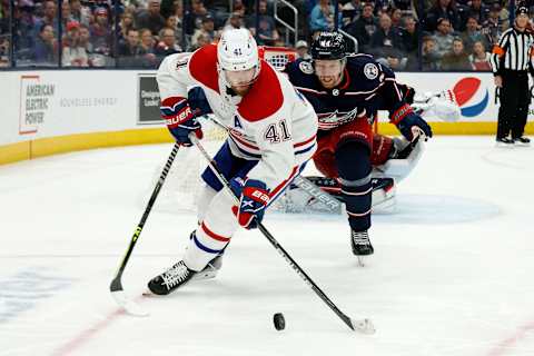 COLUMBUS, OH – APRIL 13: Paul Byron #41 of the Montreal Canadiens skates the puck away from Vladislav Gavrikov #44 of the Columbus Blue Jackets during the third period at Nationwide Arena on April 13, 2022 in Columbus, Ohio. Columbus defeated Montreal 5-1. (Photo by Kirk Irwin/Getty Images)