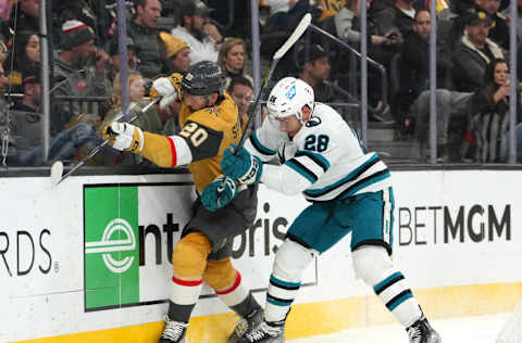 Nov 15, 2022; Las Vegas, Nevada, USA; San Jose Sharks right wing Timo Meier (28) checks Vegas Golden Knights center Chandler Stephenson (20) off the puck during the first period at T-Mobile Arena. Mandatory Credit: Stephen R. Sylvanie-USA TODAY Sports