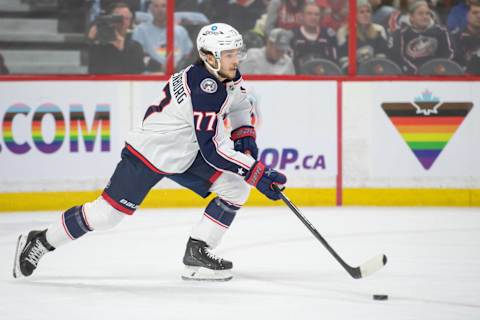 Mar 5, 2023; Ottawa, Ontario, CAN; Columbus Blue Jackets defenseman Nick Blankenburg (77) skates with the puck in the first period against the Ottawa Senators at the Canadian Tire Centre. Mandatory Credit: Marc DesRosiers-USA TODAY Sports