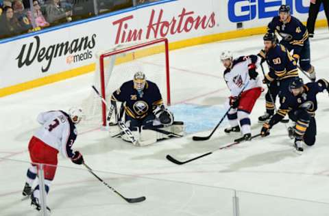 BUFFALO, NY – JANUARY 11: Linus Ullmark #35 of the Buffalo Sabres tends goal against Seth Jones #3 of the Columbus Blue Jackets during an NHL game on January 11, 2018 at KeyBank Center in Buffalo, New York. (Photo by Bill Wippert/NHLI via Getty Images)