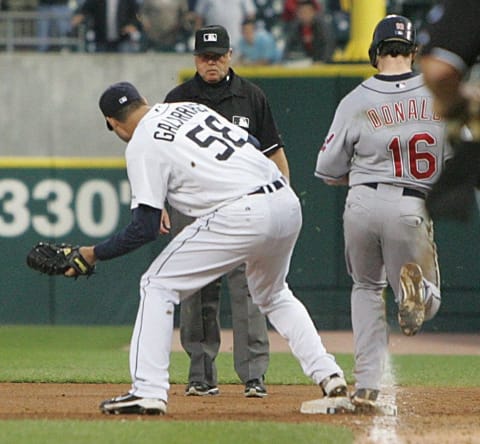 The famous play: Jim Joyce prepares to call Jason Donald safe at first, ending Armando Galarraga’s bid for a perfect game.