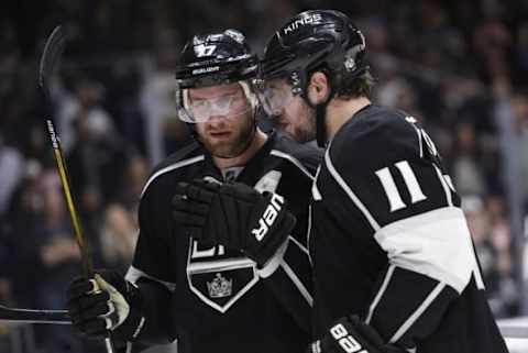 Mar 19, 2016; Los Angeles, CA, USA; Los Angeles Kings center Anze Kopitar (11) and center Jeff Carter (77) talk during the third period against the Boston Bruins at Staples Center. The Los Angeles Kings won 2-1. Mandatory Credit: Kelvin Kuo-USA TODAY Sports