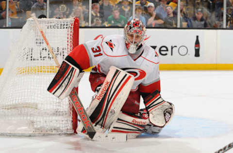 BOSTON, MA – APRIL 8: Dan Ellis #31 of the Carolina Hurricanes watches the play against the Boston Bruins at the TD Garden on April 8, 2013 in Boston, Massachusetts. (Photo by Steve Babineau/NHLI via Getty Images)