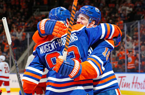 Oct 20, 2022; Edmonton, Alberta, CAN; Edmonton Oilers forward Ryan Nugent-Hopkins (93) celebrates after scoring during the third period goal against Carolina Hurricanes the at Rogers Place. Mandatory Credit: Perry Nelson-USA TODAY Sports