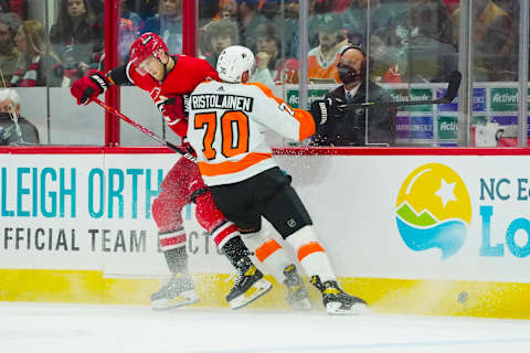 Rasmus Ristolainen, Philadelphia Flyers and Steven Lorentz, Carolina Hurricanes (Mandatory Credit: James Guillory-USA TODAY Sports)