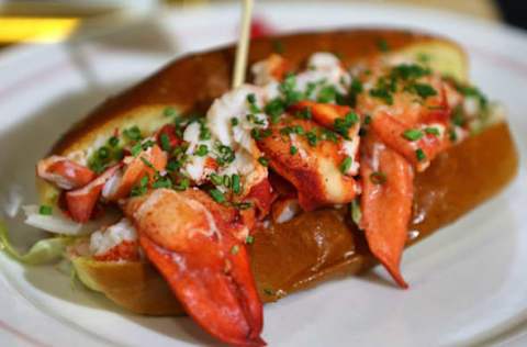 BOSTON – APRIL 3: A lobster roll is displayed at a left field concession stand at Fenway Park in Boston on April 3, 2018. The Boston Red Sox held a tour of Fenway Park to preview their improvements in the off-season, as workers were putting final touches on, in preparation for Thursday’s home opener. (Photo by John Tlumacki/The Boston Globe via Getty Images)