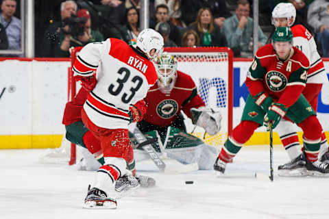 Apr 4, 2017; Saint Paul, MN, USA; Carolina Hurricanes forward Derek Ryan (33) shoots in the third period against the Minnesota Wild goalie Devan Dubnyk (40) at Xcel Energy Center. The Minnesota Wild beat the Carolina Hurricanes 5-3. Mandatory Credit: Brad Rempel-USA TODAY Sports