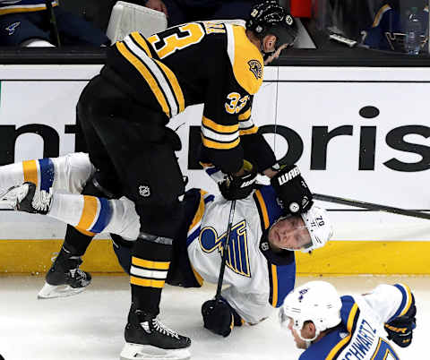 BOSTON – OCTOBER 26: Boston Bruins defenseman Zdeno Chara (33) levels St. Louis Blues center Oskar Sundqvist (70) during the first period. The Boston Bruins host the St. Louis Blues in a regular season NHL hockey game at TD Garden in Boston on Oct. 26, 2019. (Photo by Barry Chin/The Boston Globe via Getty Images)