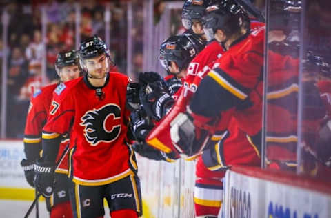 Mar 14, 2016; Calgary, Alberta, CAN; Calgary Flames right wing Michael Frolik (67) celebrates his goal with teammates against the St. Louis Blues during the third period at Scotiabank Saddledome. Calgary Flames won 7-4. Mandatory Credit: Sergei Belski-USA TODAY Sports