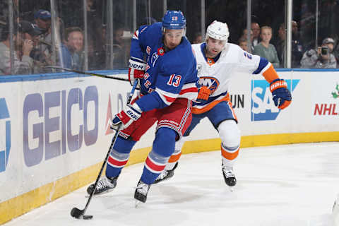 NEW YORK, NY – NOVEMBER 21: Kevin Hayes #13 of the New York Rangers skates with the puck against Nick Leddy #2 of the New York Islanders at Madison Square Garden on November 21, 2018 in New York City. The New York Rangers won 5-0. (Photo by Jared Silber/NHLI via Getty Images)