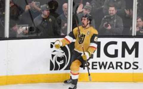 LAS VEGAS, NEVADA – DECEMBER 12: Mark Stone #61 of the Vegas Golden Knights reacts after scoring a goal against the Calgary Flames in overtime to win their game 5-4 at T-Mobile Arena on December 12, 2023, in Las Vegas, Nevada. (Photo by Candice Ward/Getty Images)