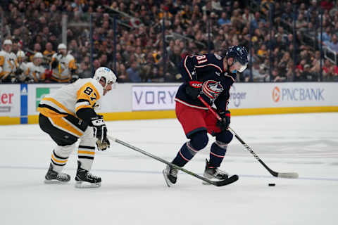 COLUMBUS, OHIO – APRIL 13: Stanislav Svozil #81 of the Columbus Blue Jackets controls the puck while Sidney Crosby #87 of the Pittsburgh Penguins defends during the second period at Nationwide Arena on April 13, 2023 in Columbus, Ohio. (Photo by Jason Mowry/Getty Images)