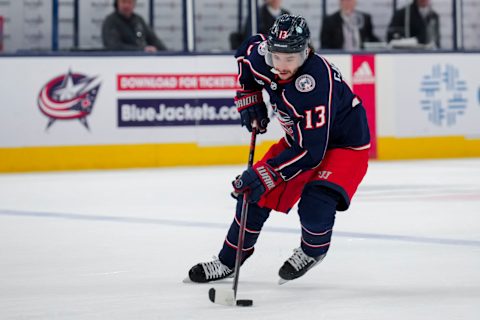 Nov 2, 2023; Columbus, Ohio, USA; Columbus Blue Jackets left wing Johnny Gaudreau (13) skates with the puck as he scores an empty net goal against the Tampa Bay Lightning in the third period at Nationwide Arena. Mandatory Credit: Aaron Doster-USA TODAY Sports