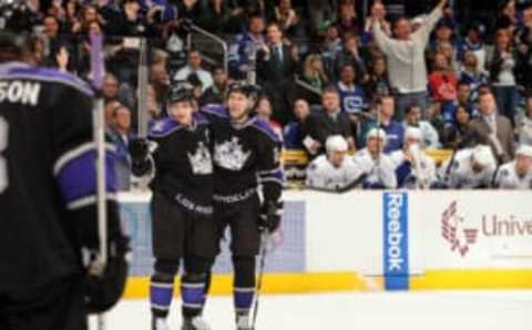 LOS ANGELES, CA – APRIL 1: Anze Kopitar #11 and Alexander Frolov #24 of the Los Angeles Kings celebrate a first period goal against the Vancouver Canucks on April 1, 2010 at Staples Center in Los Angeles, California. (Photo by Andrew D. Bernstein/NHLI via Getty Images)