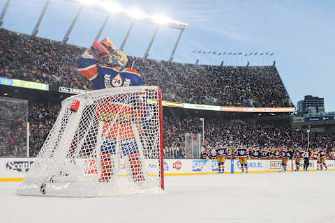 EDMONTON, CANADA – OCTOBER 29: Stuart Skinner #74 of the Edmonton Oilers takes a drink during a break in play against the Calgary Flames during the 2023 Tim Hortons NHL Heritage Classic at Commonwealth Stadium on October 29, 2023 in Edmonton, Alberta, Canada. The Oilers defeated the Flames 5-2. (Photo by Derek Leung/Getty Images)