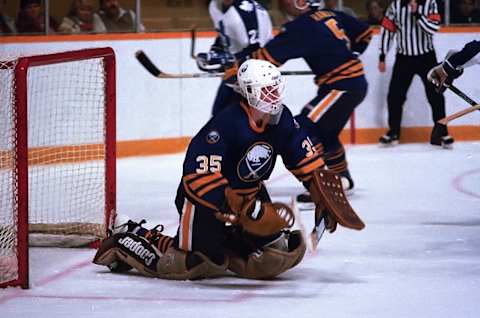 TORONTO, ON – NOVEMBER 30: Darren Puppa #35 Buffalo Sabres stops a shot against the Toronto Maple Leafs in game action on November 30, 1985 at Maple Leafs Gardens in Toronto, Ontario, Canada. (Photo by Graig Abel Collection/Getty Images)