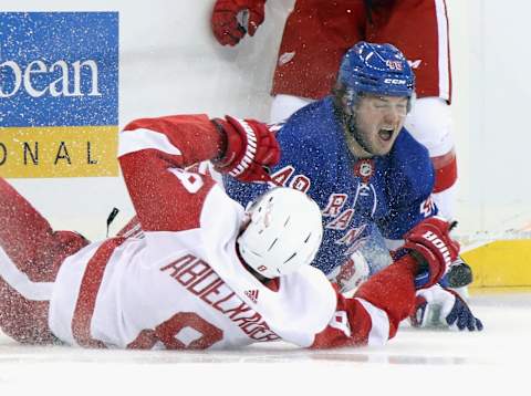 NEW YORK, NEW YORK – NOVEMBER 06: Justin Abdelkader #8 of the Detroit Red Wings takes a second period penalty for roughing Brendan Lemieux #48 of the New York Rangers at Madison Square Garden on November 06, 2019 in New York City. (Photo by Bruce Bennett/Getty Images)