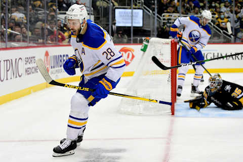 PITTSBURGH, PENNSYLVANIA – DECEMBER 17: Zemgus Girgensons #28 of the Buffalo Sabres celebrates his goal during the second period of a game against the Pittsburgh Penguins at PPG PAINTS Arena on December 17, 2021 in Pittsburgh, Pennsylvania. (Photo by Emilee Chinn/Getty Images)