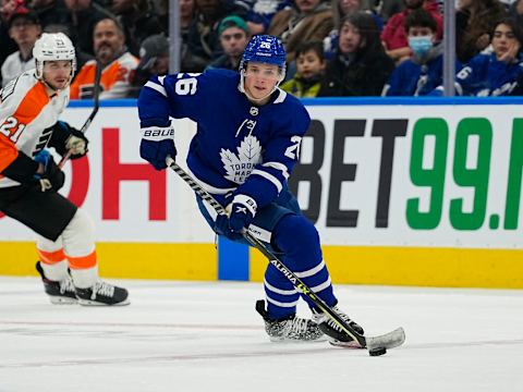 Apr 19, 2022; Toronto, Ontario, CAN; Toronto Maple Leafs forward Nick Abruzzese (26) carries the puck against the Philadelphia Flyers during the third period at Scotiabank Arena. Mandatory Credit: John E. Sokolowski-USA TODAY Sports