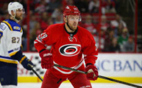 Carolina Hurricanes forward Bryan Bickell (29) skates against the St. Louis Blues in Carolina Red (James Guillory-USA TODAY Sports)